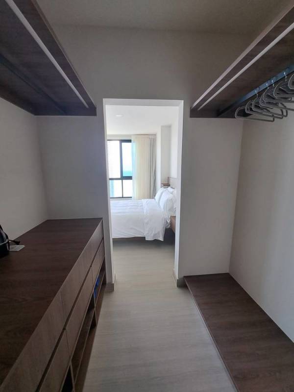 Spacious walk-in closet with shelving at PH Arcadia Panama