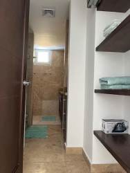 Contemporary bathroom with glass enclosure and granite counters at PH El Tucán