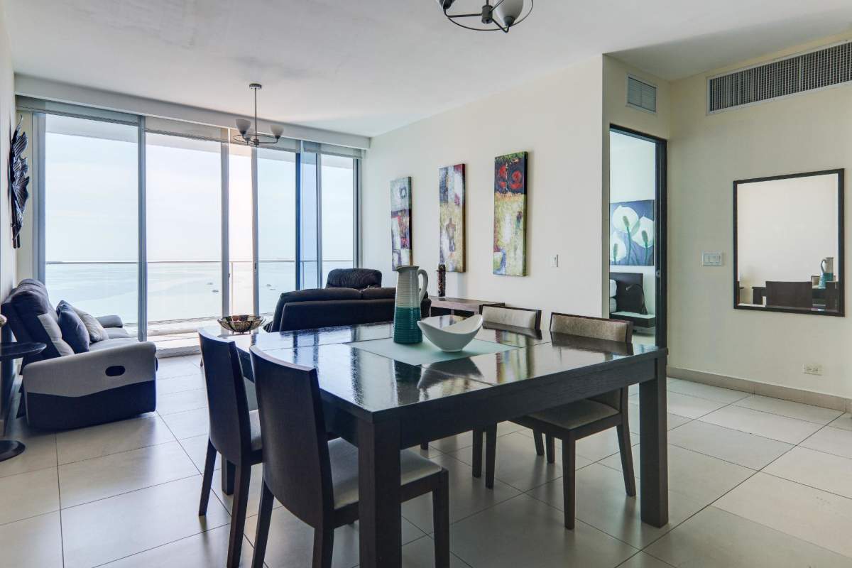 Fully equipped kitchen with granite countertops and stainless appliances in PH Destiny apartment Panama City