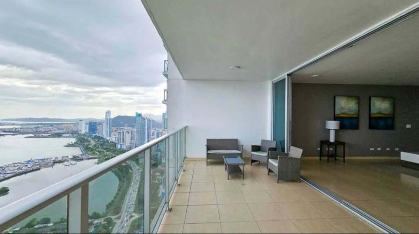 Open living dining room with panoramic city skyline views Waters on the Bay Panama