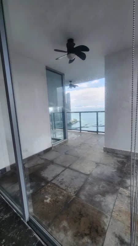 Modern covered balcony with fans, ocean view in PH Yoo & Arts Panama City