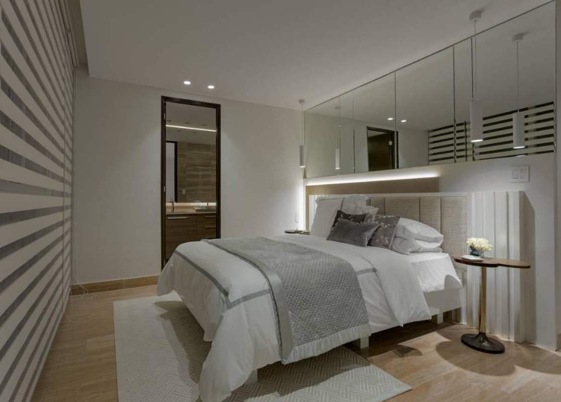 Ensuite bathroom with glass shower and designer fixtures at PH The Regent Costa del Este Panama