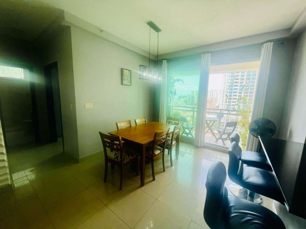 Bright living dining room with balcony access in PH Coral Tower Panama for sale