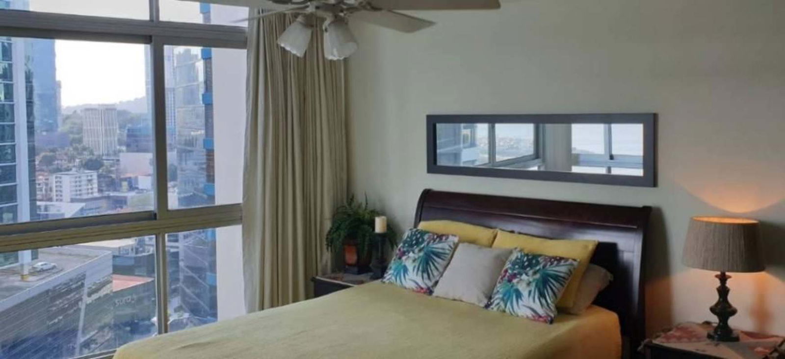 Master suite with large windows, closet space and ocean views PH Bay Front Tower Panama City