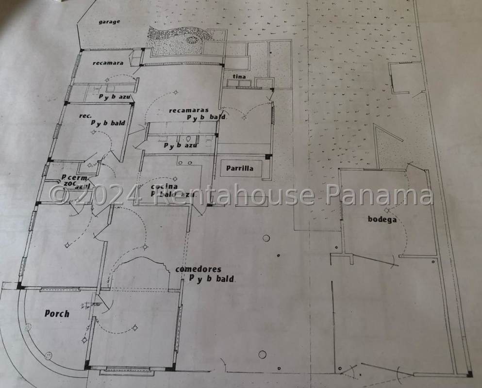 Covered terrace with arches, wooden beams, potted plants San Francisco Panama Investment