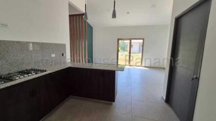 Bright living and dining room with ceramic tile floors and large windows Villa Guadalupe David Panama