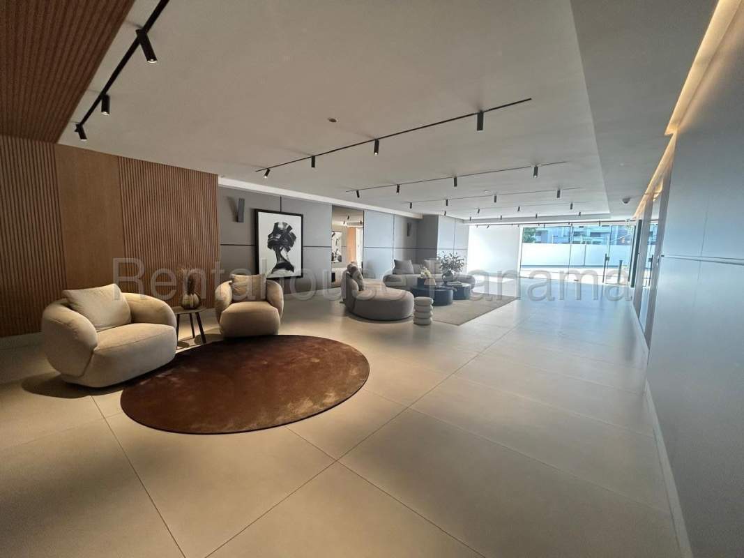 Living and dining area with tiled floors and balcony access overlooking ocean, PH Coco del Mar Panama City