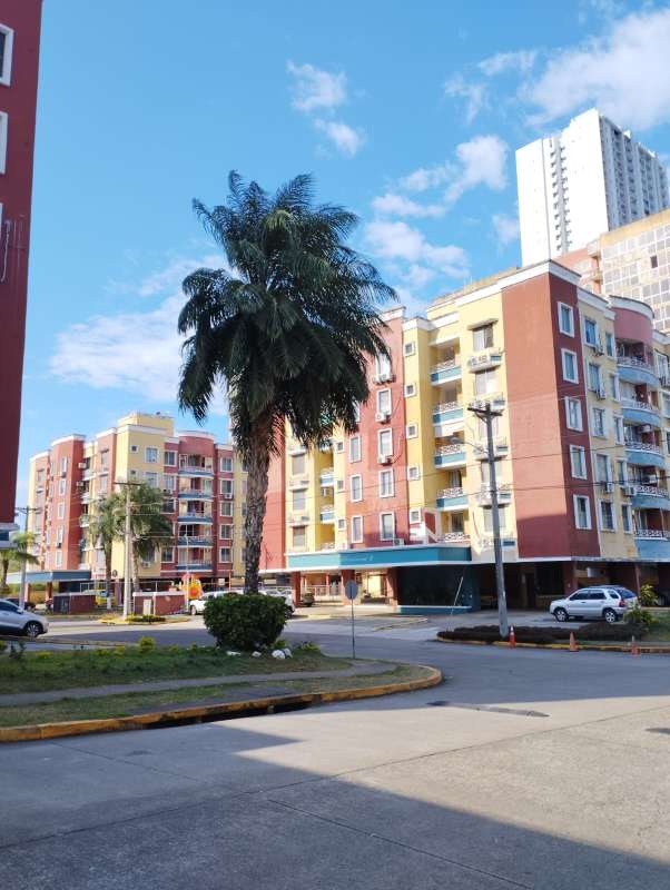 Bright living dining space leading to balcony in PH Torres de Milán Panama City apartment