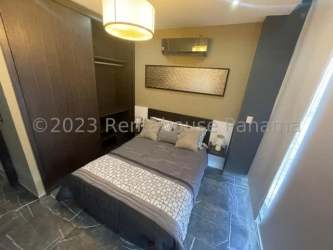 Modern bedroom with closet, neutral tones Santa Cruz Tower David Panama