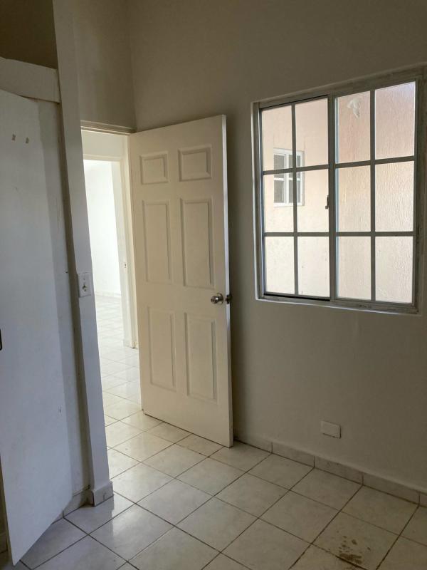 Interior hallway bright with ceramic tiles PH Mirador del Bosque Pacora Panama