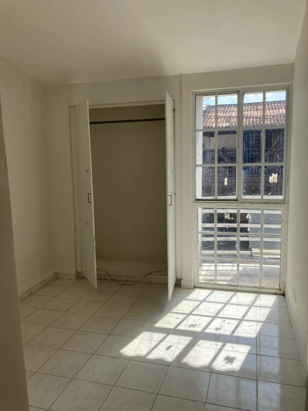 Two-story townhouse facade with balcony in PH Mirador del Bosque Pacora Panama