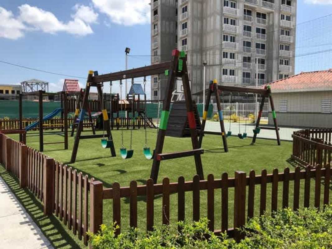 Aerial of residential swimming pool with deck in Torres de Versalles Panama
