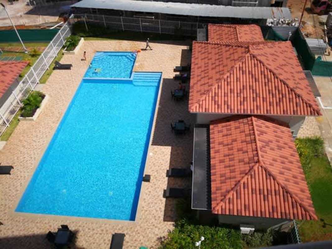 Modern playground area with swings and slides inside Torres de Versalles complex Panama