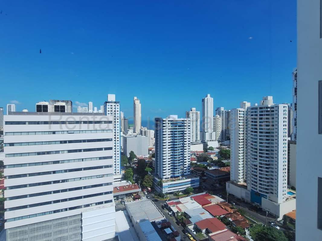 Modern bathroom with dual vessel sinks, large mirrors and glass shower PH San Francisco Bay Tower Panama