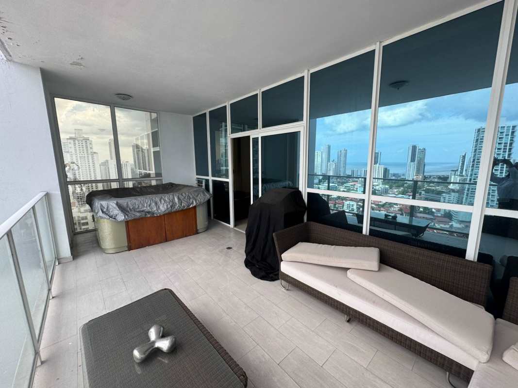 Living area with access to balcony, bright open floor plan in PH San Francisco Bay Panama City