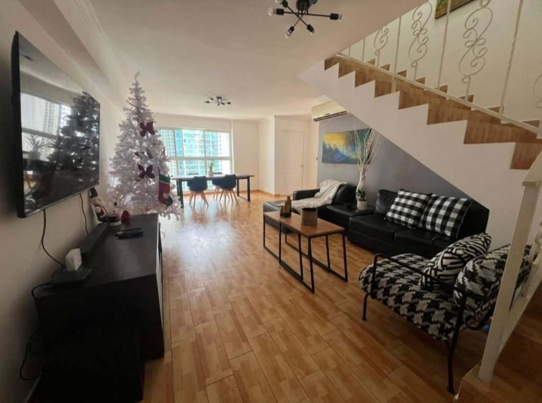 Kitchen with wood cabinets and city view PH Pacific Blue Panama