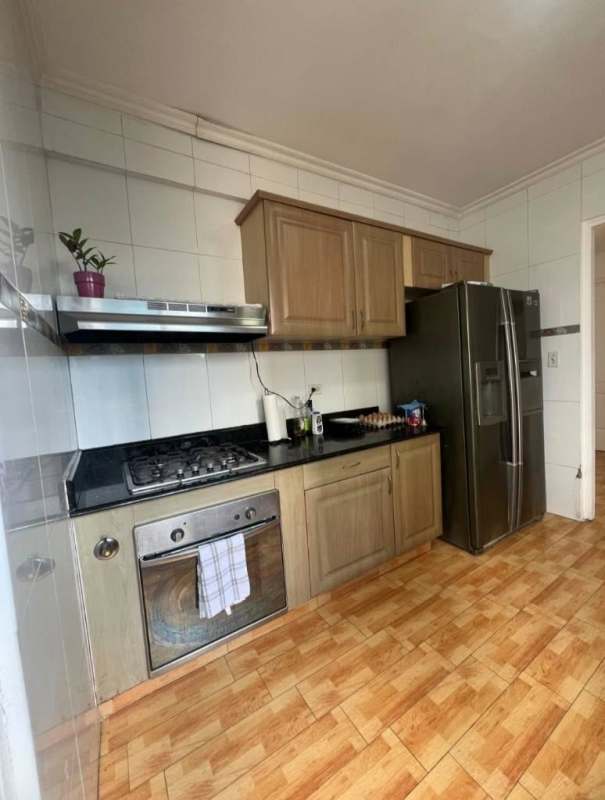 Living room with panoramic windows and city view PH Pacific Blue Panama