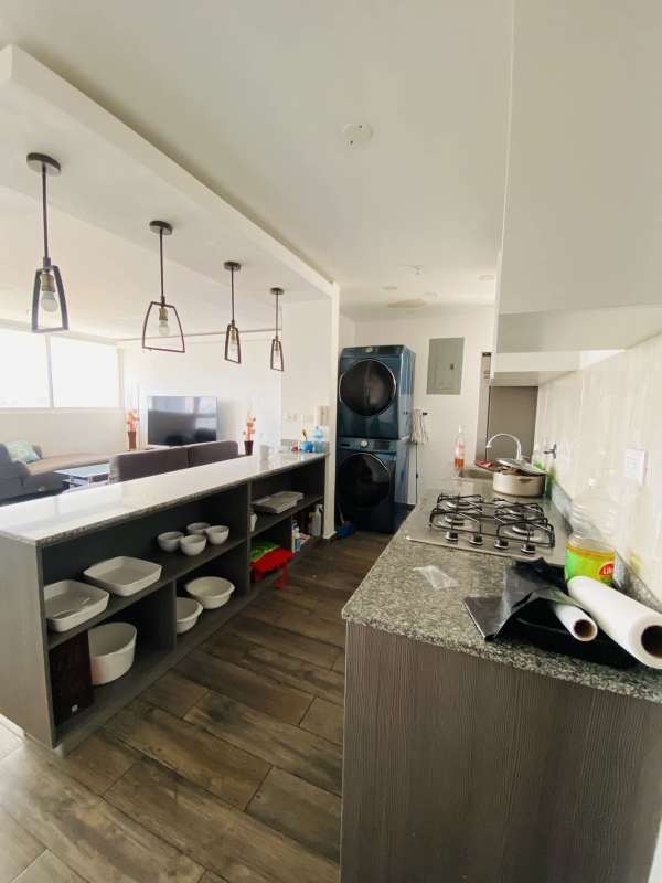 Open modern kitchen granite countertops PH Avión Towers Condado del Rey Panama City