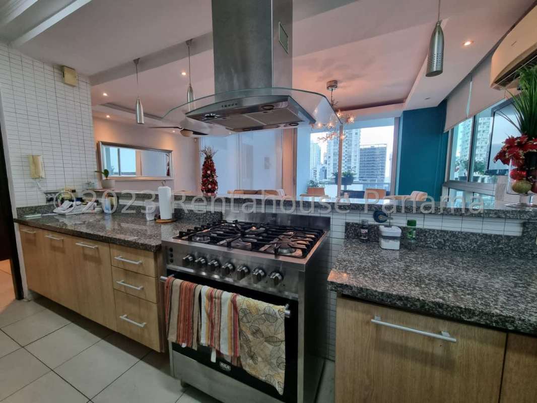 Modern living and dining space with large windows PH San Francisco Bay