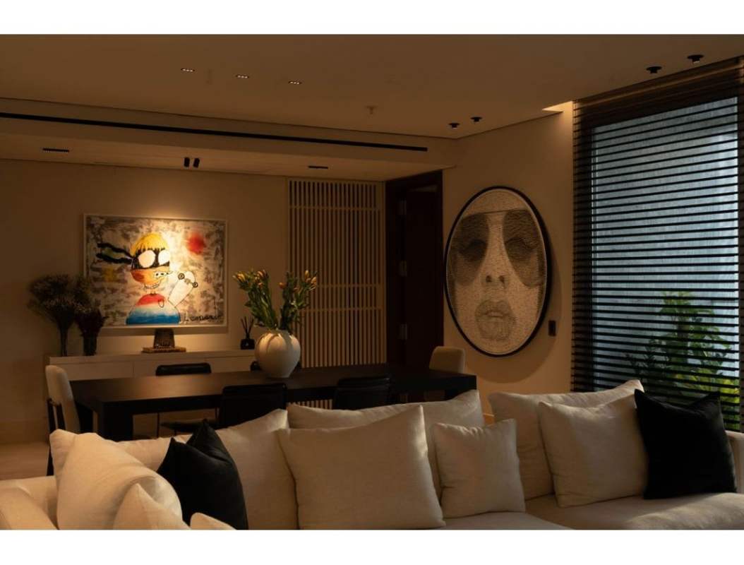 Luxury bedroom with smart curtains and panoramic skyline view in PH Windrose Coco del Mar