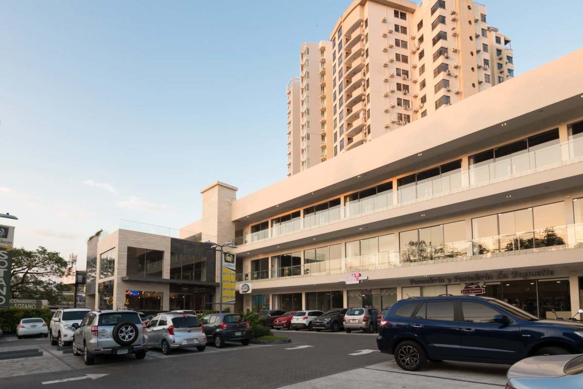 Plaza El Cangrejo exterior with residential high-rises and parking in Panama City