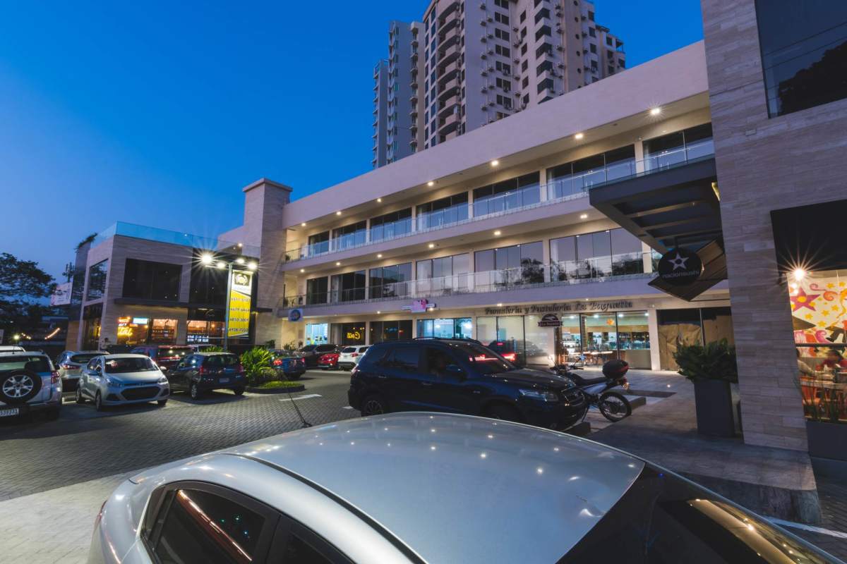 Glass-edged balcony of Plaza El Cangrejo overlooking downtown Panama