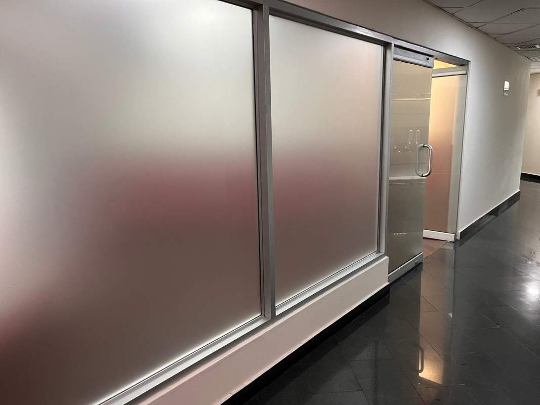 Glass facade modern skyscraper in Marbella Panama City Torre Banesco Banco