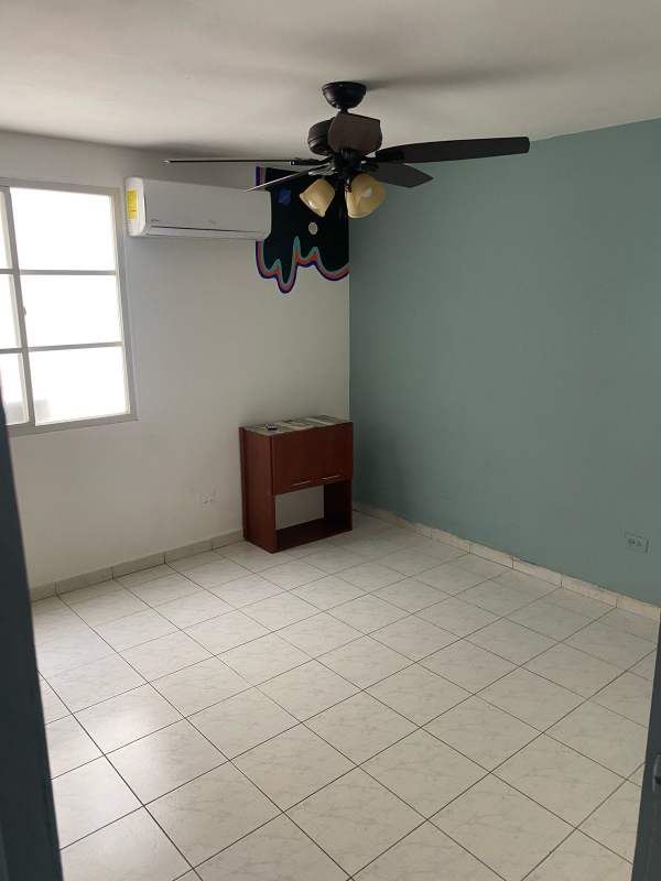 Bedroom featuring AC, closet, accent wall, near Parque Omar in Panama City