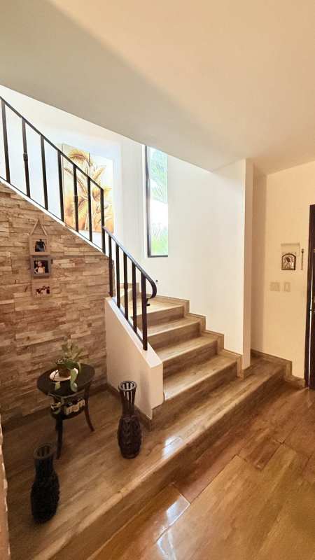 Terrace patio area with garden and BBQ setup in Costa Sur gated community house