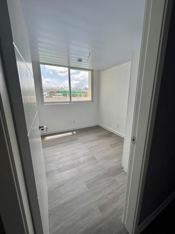Modern bathroom with tile walls and walk-in shower PH Amitie Via Tocumen Panama