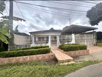 Bright living room with ceramic tile flooring and ceiling fan in a residential-commercial property for rent David Chiriquí Panama