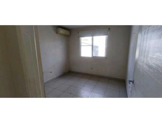 Bright bedroom with tiled floors, closet space rental house Playa Dorada