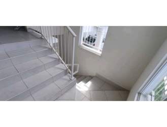 Modern bathroom granite countertop, glass shower, tiled wall Playa Dorada Arraiján