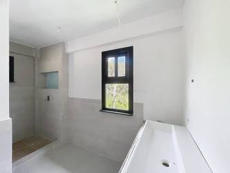 Open modern kitchen with island mountain house Chicá Chame Panama