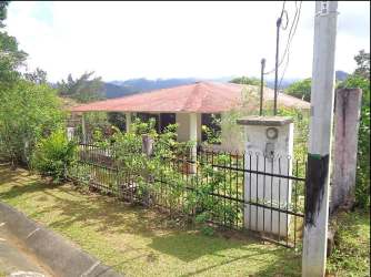 Traditional single family house gated yard Santa Fe Colón Panama