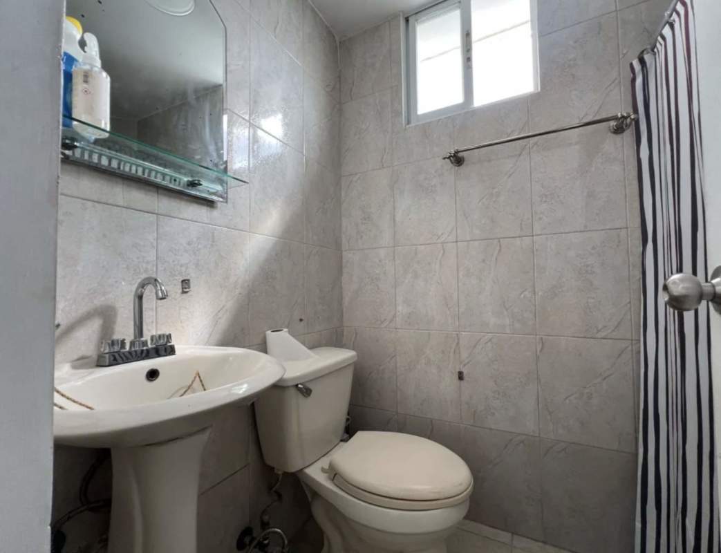 Contemporary bathroom with walk-in shower in PH Trinity Tower Panama City