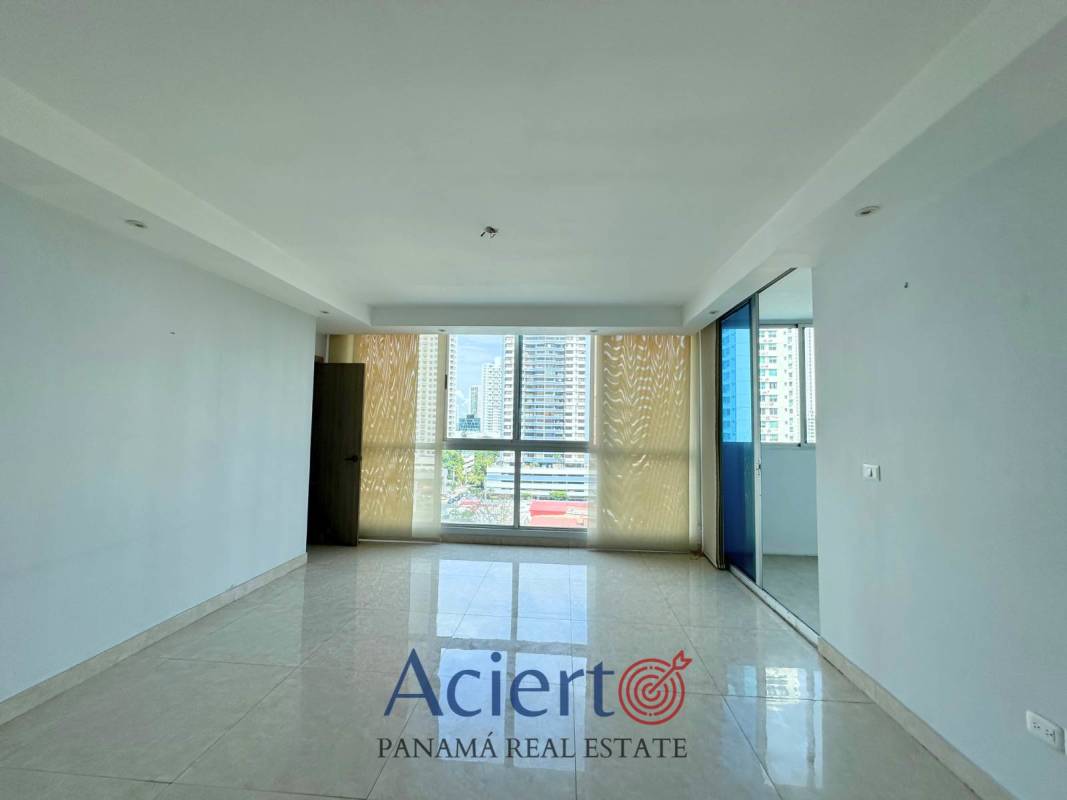 Bright open living room with large windows, tile floor, recessed ceiling at PH San Francisco Diamond Tower Panama