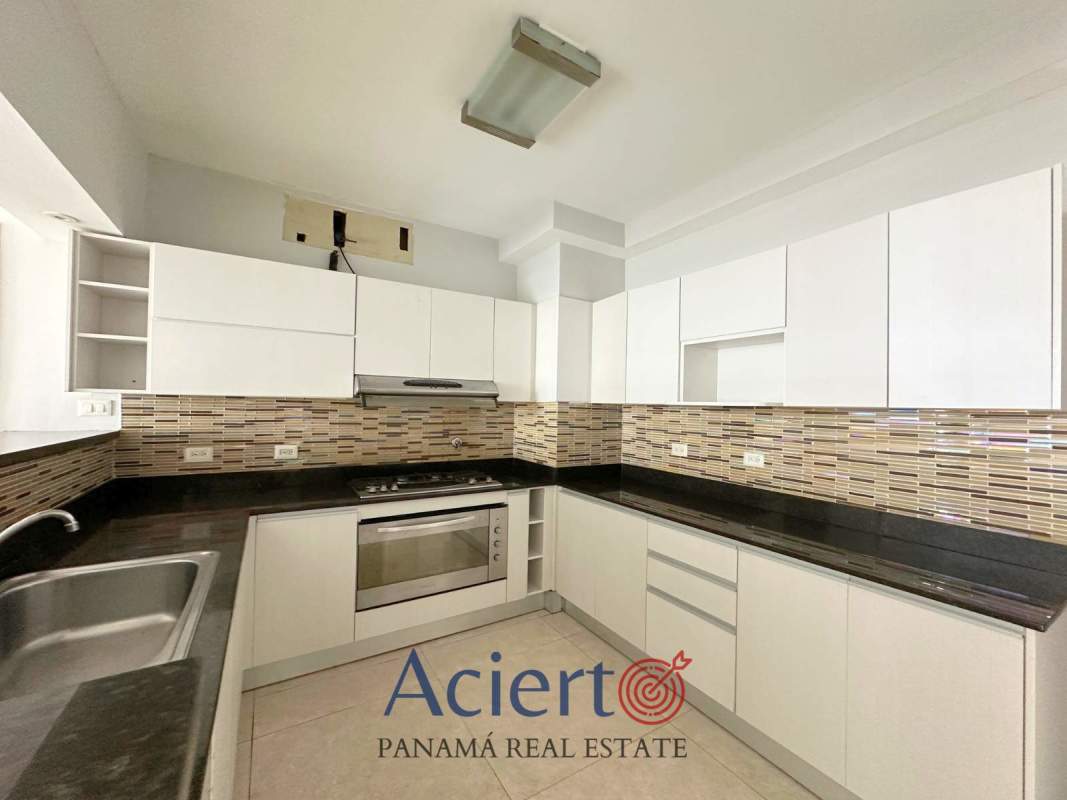 Contemporary apartment kitchenette with granite countertops, tiled backsplash in San Francisco Diamond Tower