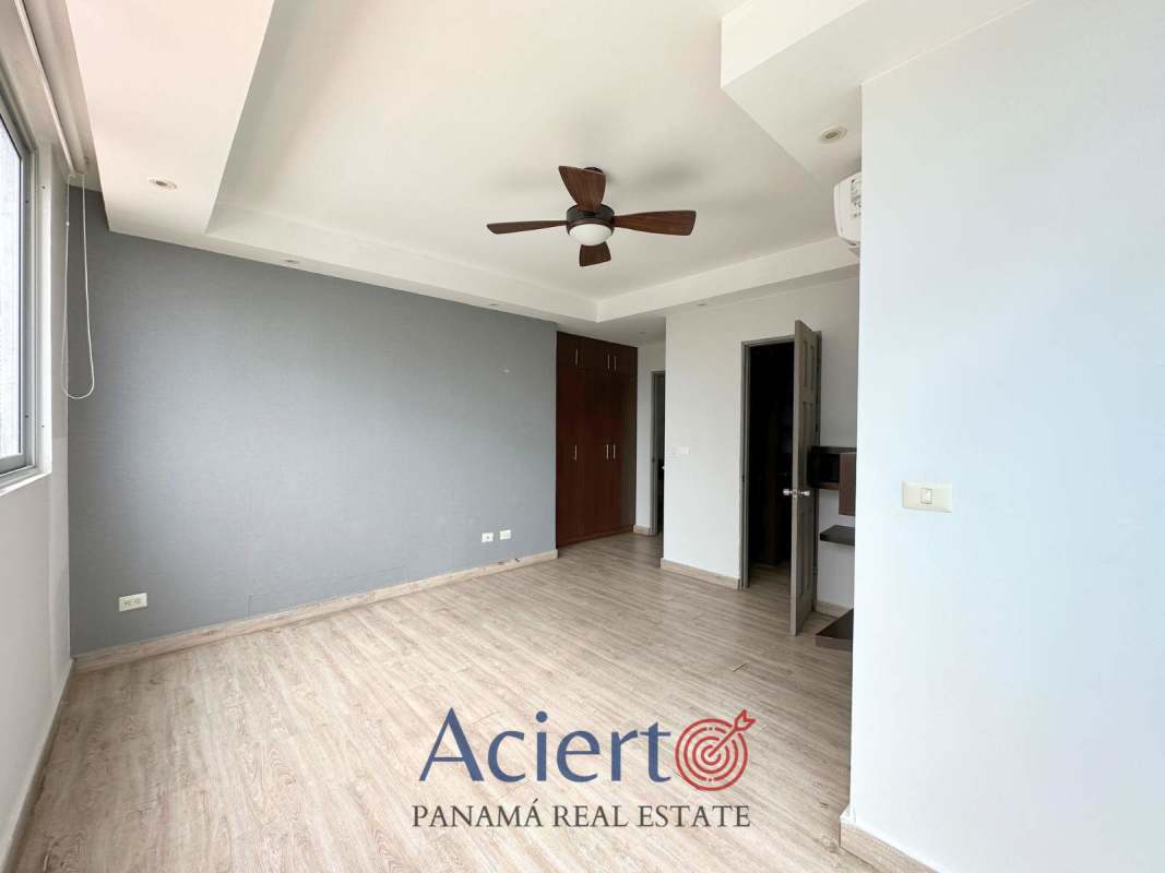 Sunny bedroom with large window wood floors closet in PH San Francisco Diamond Tower Panama