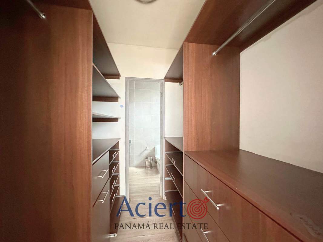 Bedroom in San Francisco Diamond Tower with wood flooring, window, and closet