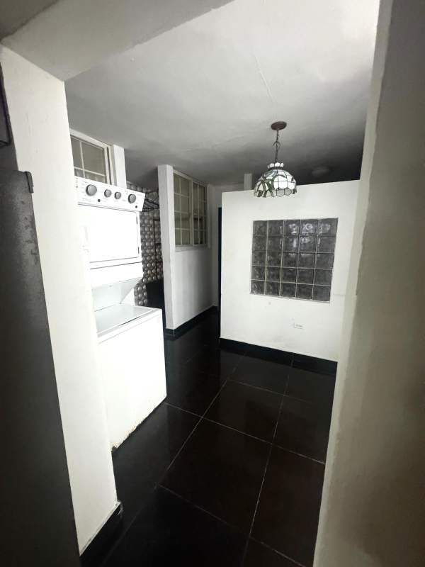 Bedroom featuring two beds, large closets, AC and windows in PH Altamira El Cangrejo Panama