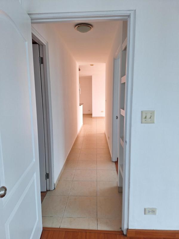 Outdoor swimming pool with lounge chairs and pergola at PH Premium Point Panama City