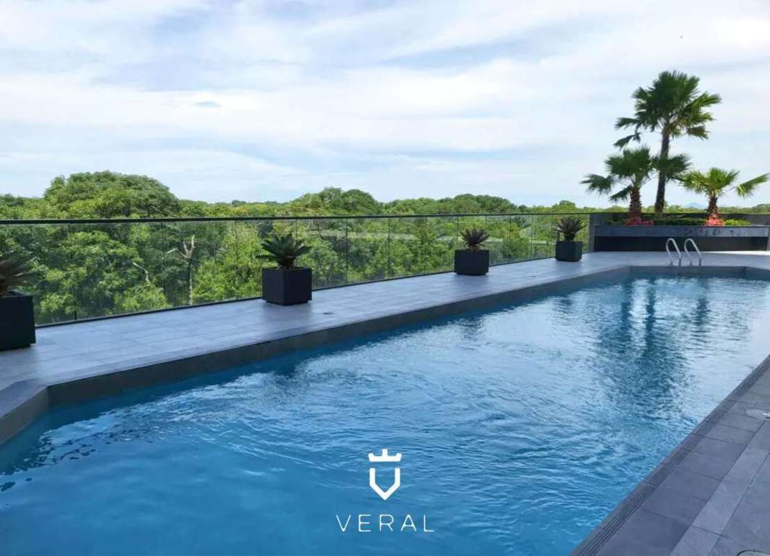 Infinity pool on terrace overlooking golf course at Empire Residences Santa Maria Panama