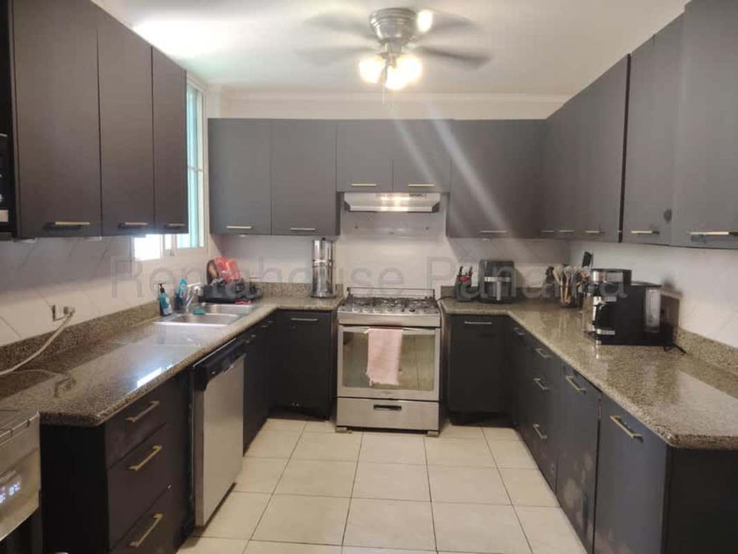 Spacious granite kitchen with stainless steel appliances and cabinetry in PH Pacific Point Punta Pacifica