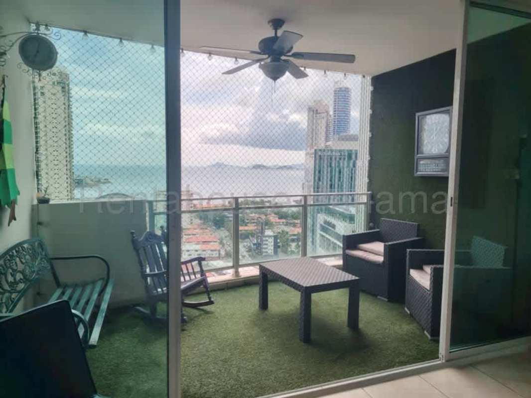 Modern apartment covered balcony overlooking ocean with safety netting at PH Pacific Point Punta Pacifica