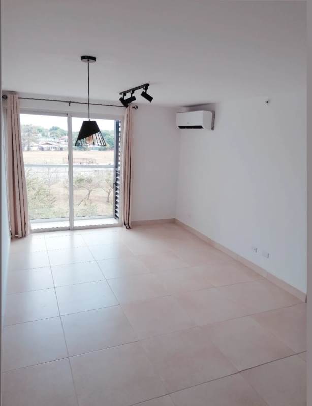 Modern rental apartment living dining room large window natural light Panama Viejo Residences Panama