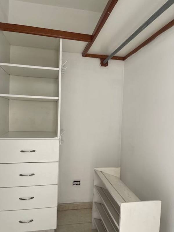 Unfurnished bedroom with large window, black frames, air conditioning at PH Plaza Real Panama