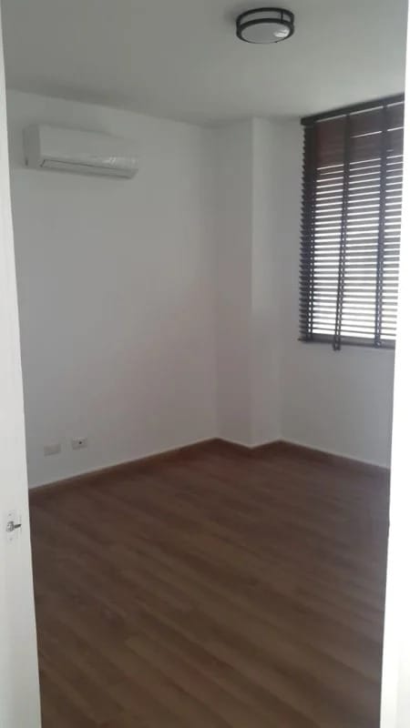 Empty bedroom with wooden floor, air conditioned at PH Privé Panama