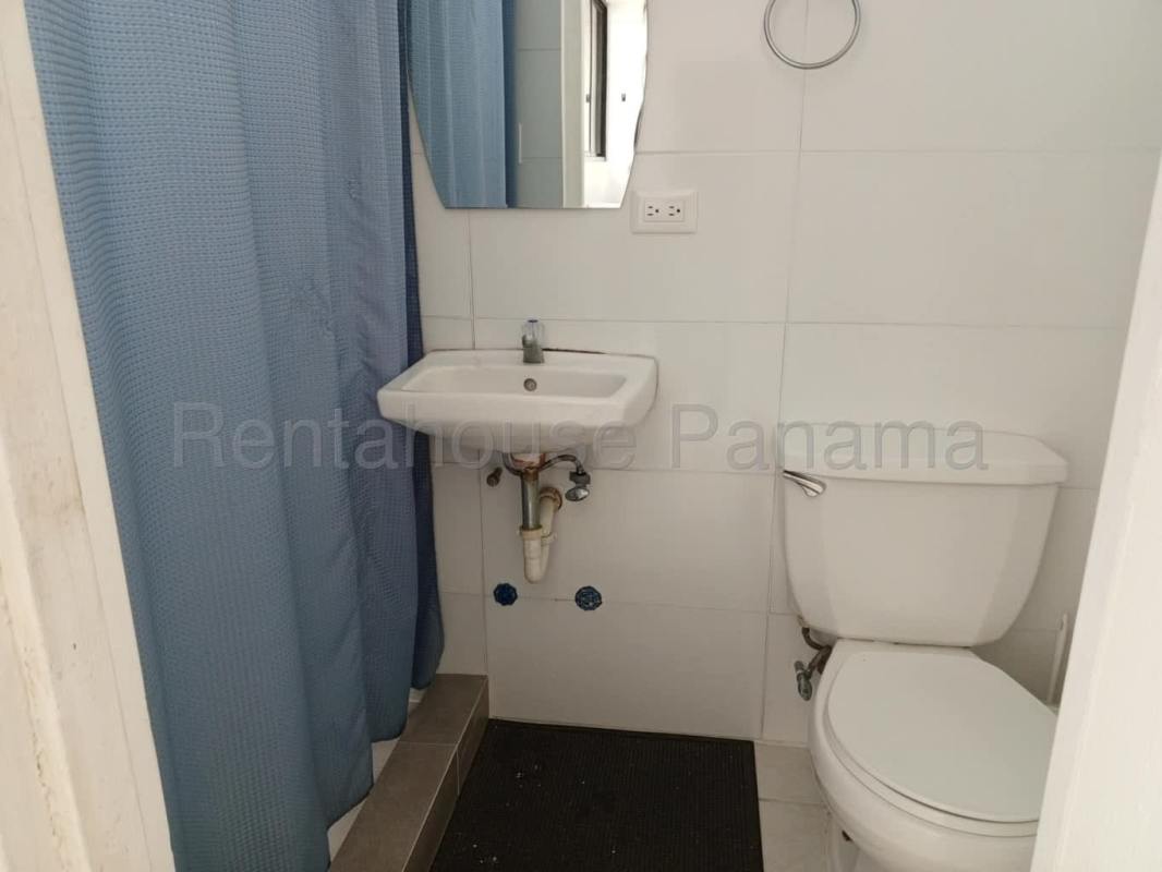 Luxury pool area with sun loungers and panoramic views in Marbella Panama rental apartment