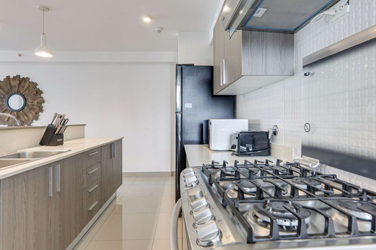 Modern kitchen with appliances in furnished apartment PH Zaphiro El Cangrejo Panama City
